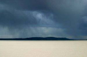 Alvord Desert with thunderstorm clouds and virga, Bureau of Land Management, Oregon, USA