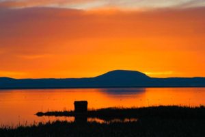 Orange-colored photo blind at sunrise, Tule Lake National Wildlife Refuge, California, USA
